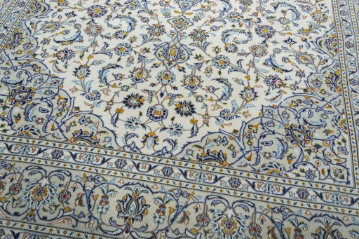 Close-up detail of 2000s Kashan rug from Iran / Persia showing Wool weave