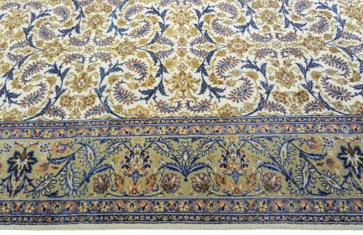 Corner detail of 1970s Kashan rug showing border pattern and Wool pile