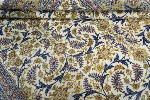 Close-up detail of 1970s Kashan rug from Iran / Persia showing Wool weave