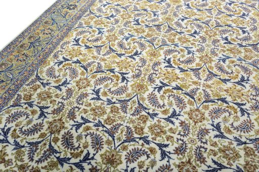 Backside of handmade 1970s Kashan rug showing knot structure and weave density