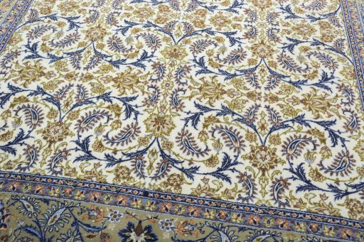 Close-up detail of 1970s Kashan rug from Iran / Persia showing Wool weave