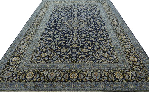 Surface texture of 2000s Kashan rug with natural Wool and intricate pattern