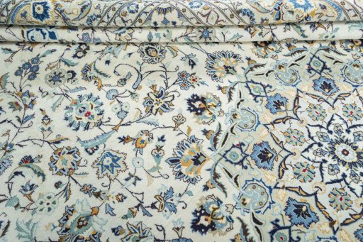 Close-up detail of 2000s Kashan rug from Iran / Persia showing Wool weave
