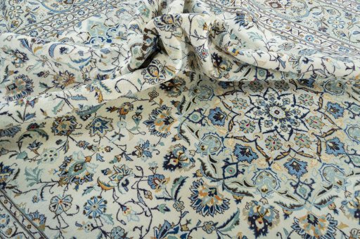 Surface texture of 2000s Kashan rug with natural Wool and intricate pattern