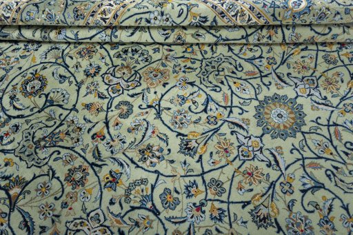Close-up detail of 2000s Kashan rug from Iran / Persia showing Wool weave