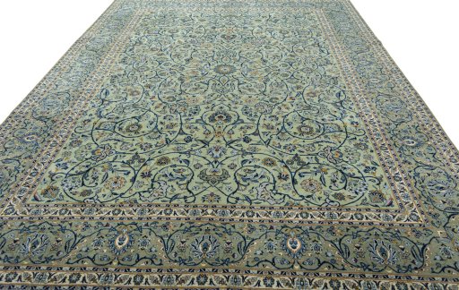 Surface texture of 2000s Kashan rug with natural Wool and intricate pattern