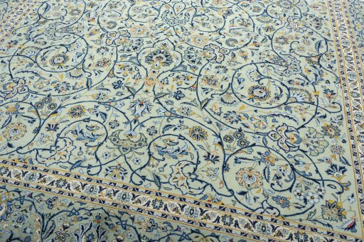 Close-up detail of 2000s Kashan rug from Iran / Persia showing Wool weave