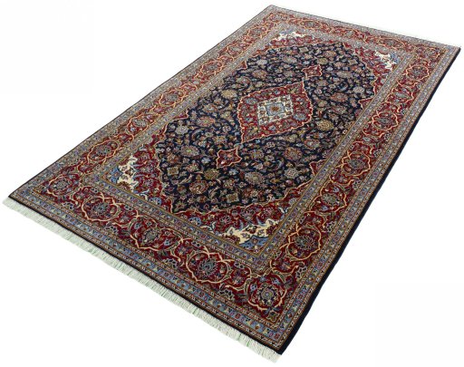 Corner detail of New Kashan rug showing border pattern and Cork pile