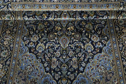Close-up detail of New Kashan rug from Iran / Persia showing Cork weave
