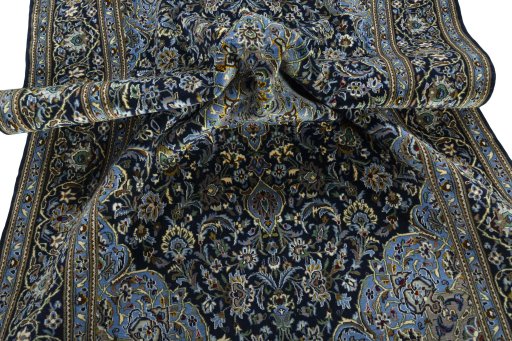 Surface texture of New Kashan rug with natural Cork and intricate pattern