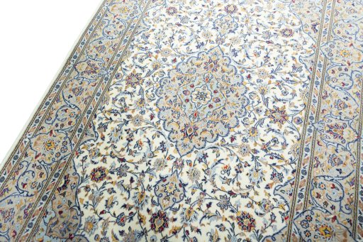 Backside of handmade New Kashan rug showing knot structure and weave density