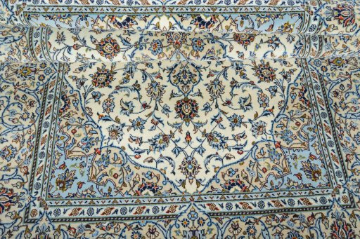 Surface texture of New Kashan rug with natural Cork and intricate pattern