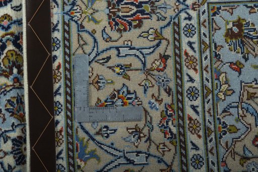Central medallion detail of New Kashan rug from Iran / Persia