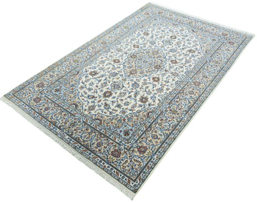 Corner detail of New Kashan rug showing border pattern and Cork pile