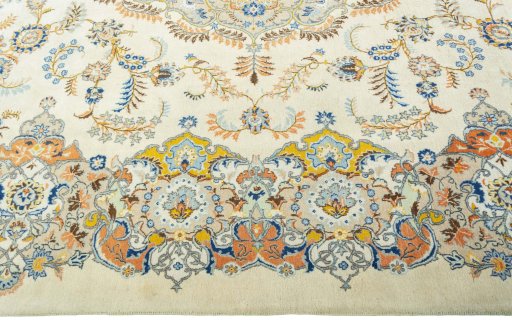 Corner detail of 1970s Kashan rug showing border pattern and Wool pile