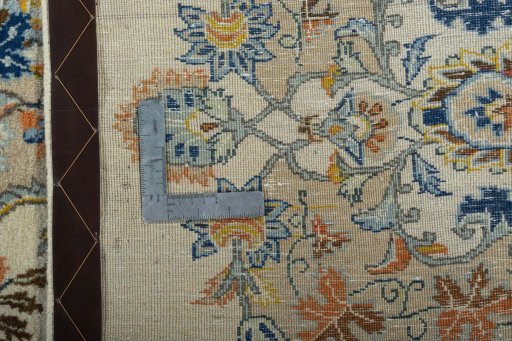 Backside of handmade 1970s Kashan rug showing knot structure and weave density