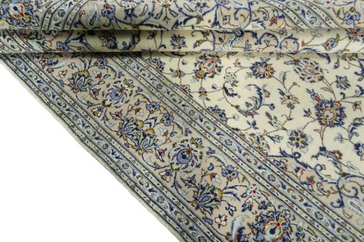 Close-up detail of 2000s Kashan rug from Iran / Persia showing Wool weave