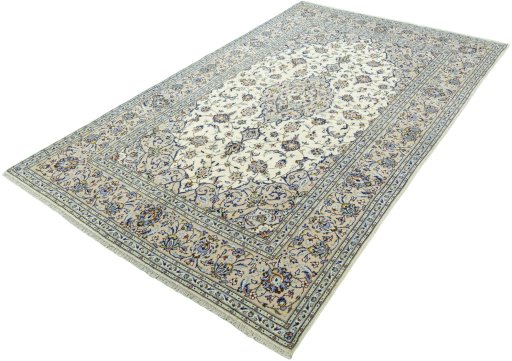 Corner detail of 2000s Kashan rug showing border pattern and Wool pile