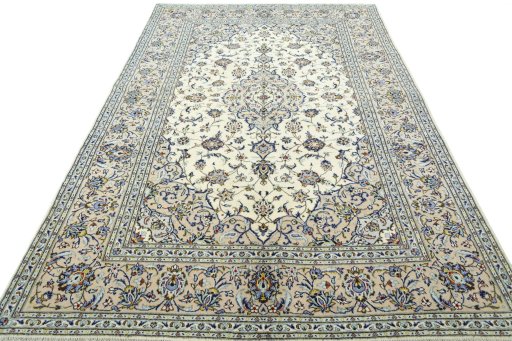 Surface texture of 2000s Kashan rug with natural Wool and intricate pattern