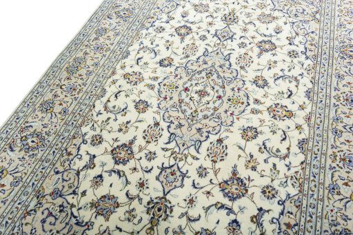 Backside of handmade 2000s Kashan rug showing knot structure and weave density