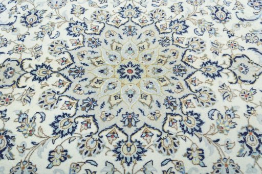 Central medallion detail of 2000s Kashan rug from Iran / Persia