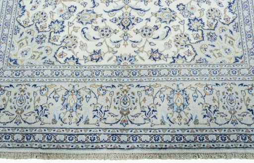 Full view of 2000s Kashan rug from Iran / Persia, 305 × 197 cm in Beige tones