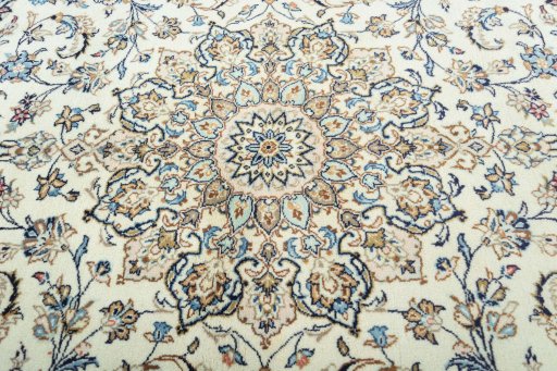 Central medallion detail of New Kashan rug from Iran / Persia