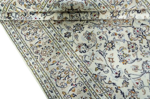 Close-up detail of 2000s Kashan rug from Iran / Persia showing Wool weave