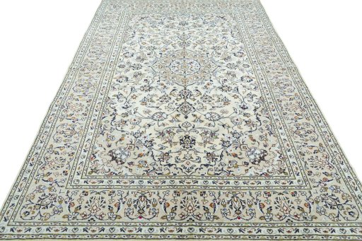 Surface texture of 2000s Kashan rug with natural Wool and intricate pattern