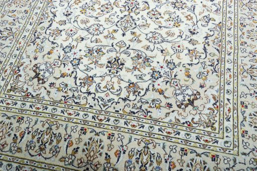 Close-up detail of 2000s Kashan rug from Iran / Persia showing Wool weave