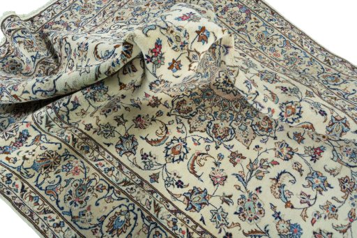 Surface texture of New Kashan rug with natural Wool and intricate pattern