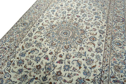 Backside of handmade New Kashan rug showing knot structure and weave density