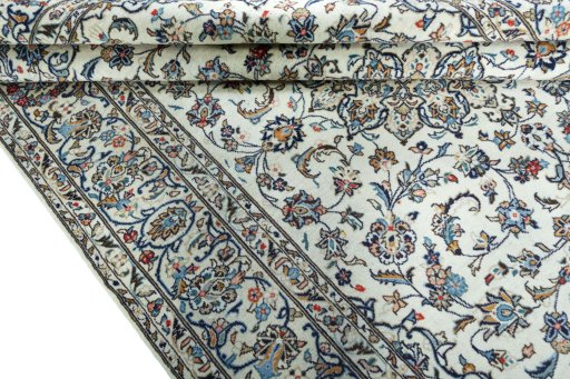 Close-up detail of 2000s Kashan rug from Iran / Persia showing Wool weave
