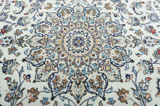 Central medallion detail of 2000s Kashan rug from Iran / Persia
