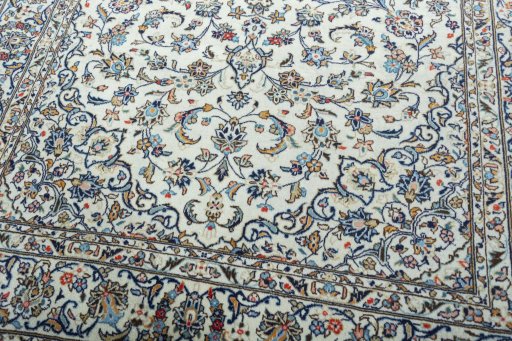 Close-up detail of 2000s Kashan rug from Iran / Persia showing Wool weave
