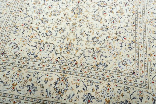 Close-up detail of 2000s Kashan rug from Iran / Persia showing Wool weave