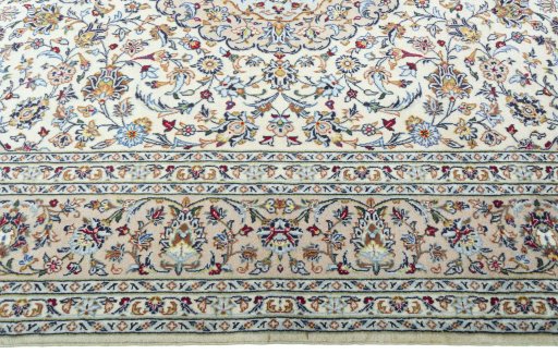 Corner detail of New Kashan rug showing border pattern and Wool pile