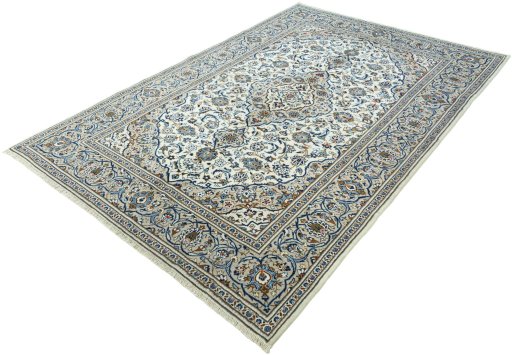 Corner detail of 2000s Kashan rug showing border pattern and Wool pile