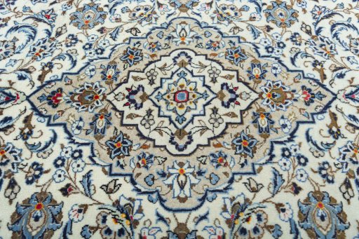 Central medallion detail of 2000s Kashan rug from Iran / Persia