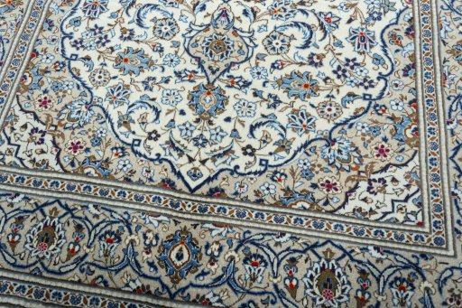 Close-up detail of 2000s Kashan rug from Iran / Persia showing Wool weave