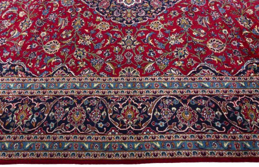 Corner detail of Unknown Kashan rug showing border pattern and Wool pile