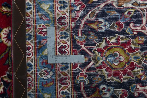 Backside of handmade Unknown Kashan rug showing knot structure and weave density