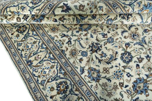 Close-up detail of New Kashan rug from Iran / Persia showing Wool weave