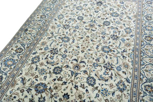 Backside of handmade New Kashan rug showing knot structure and weave density
