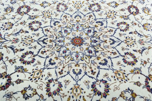 Central medallion detail of 2000s Kashan rug from Iran / Persia