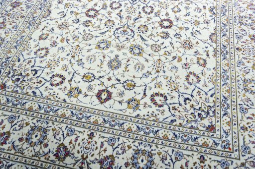 Close-up detail of 2000s Kashan rug from Iran / Persia showing Wool weave