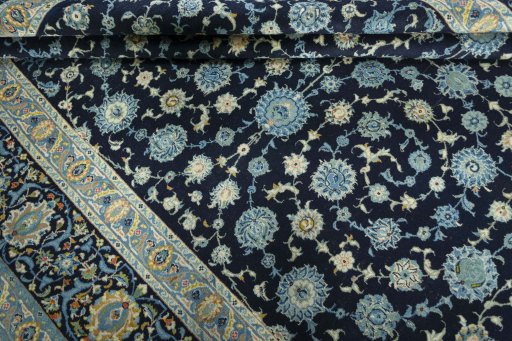 Close-up detail of 1970s Kashan rug from Iran / Persia showing Wool weave