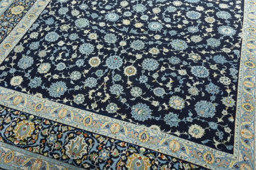 Close-up detail of 1970s Kashan rug from Iran / Persia showing Wool weave