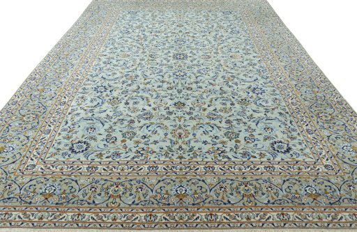 Surface texture of 2000s Kashan rug with natural Wool and intricate pattern
