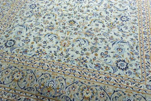 Close-up detail of 2000s Kashan rug from Iran / Persia showing Wool weave